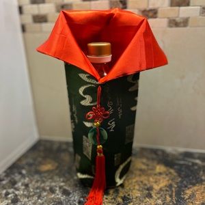 NWOT Chinese Asian fabric bottle holder red silk tassel green jade medallion